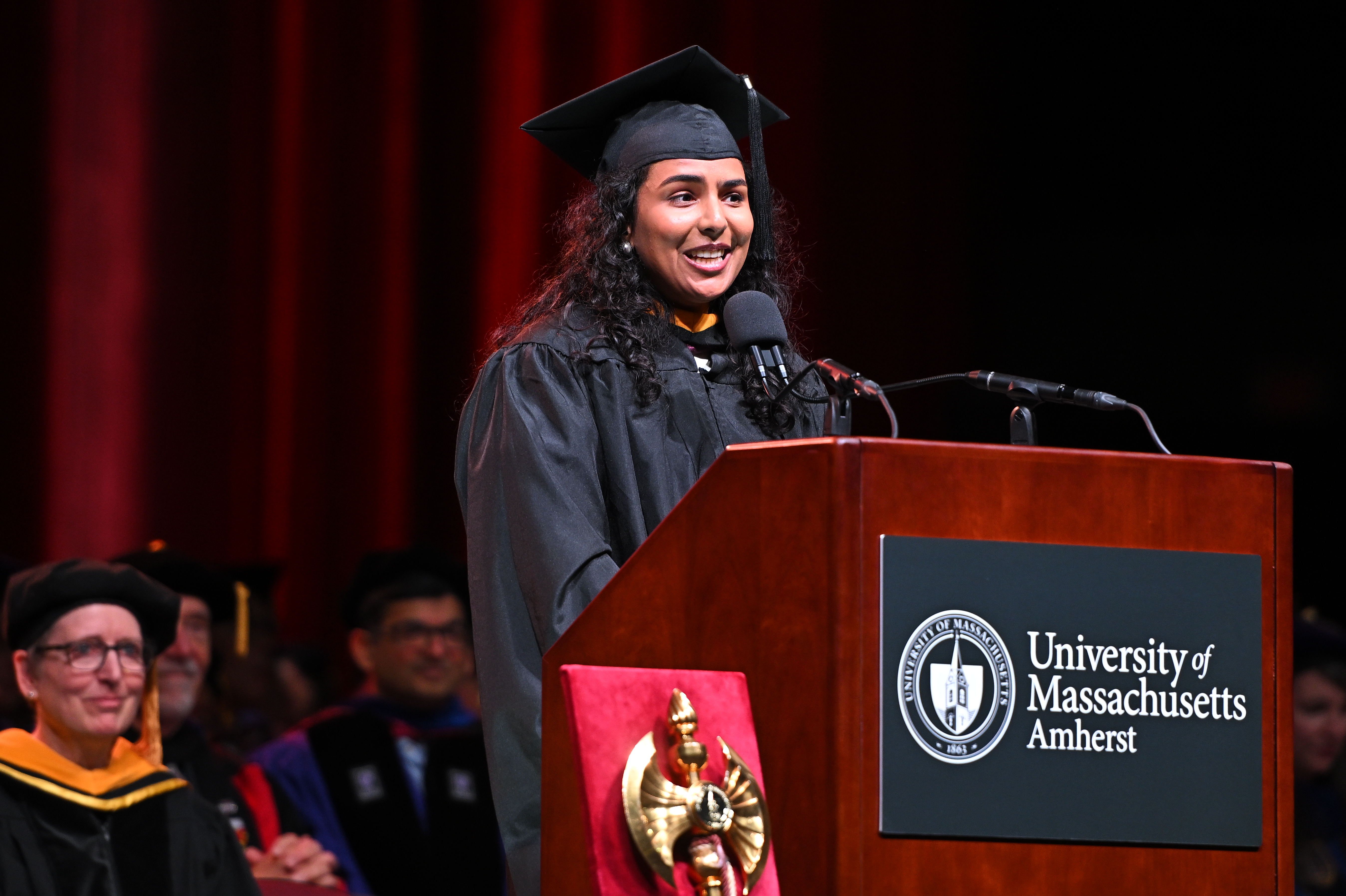 Student speaker Mansi Maheshwari addresses the 2026 Master’s and Education Specialist Commencement Ceremony at the Mullins Center on May 15, 2026.